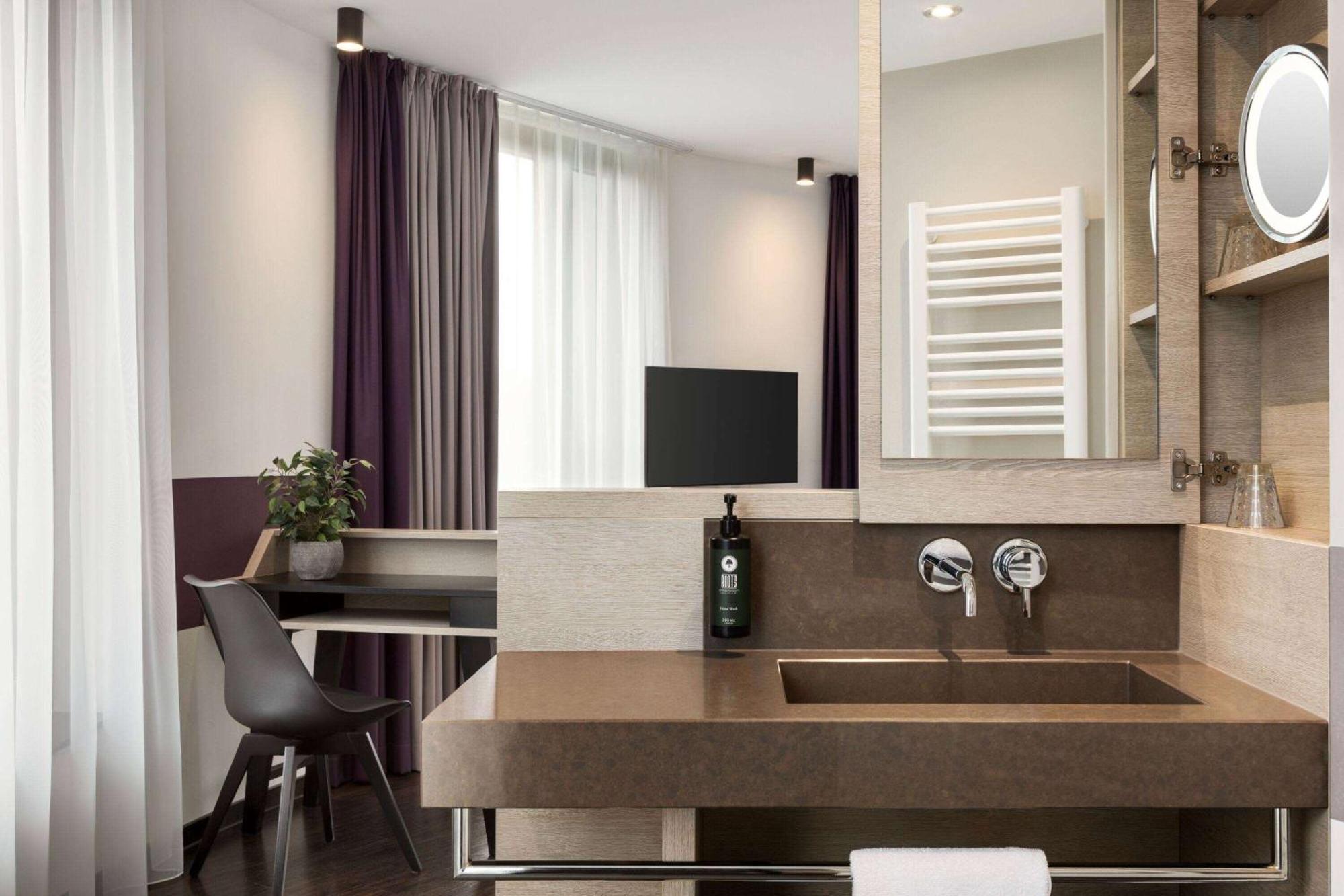 Vienna House Easy By Wyndham Osnabrueck City & Apartments Bagian luar foto